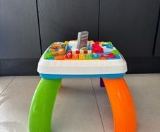 Fisher price laugh and learn smart stages around the town activity table