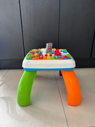 Fisher price laugh and learn smart stages around the town activity table