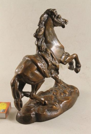 Antique bronzed horse statue