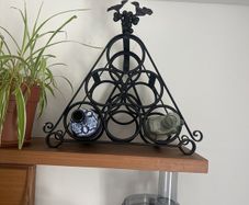 Black wrought iron wine rack