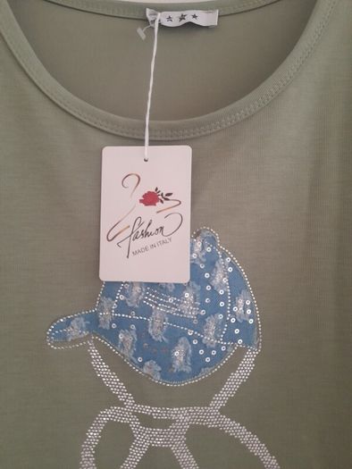 ladies new with tags olive  green in colour