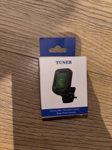 Tuner, capo and strings (guitar, ukrlele and bass)