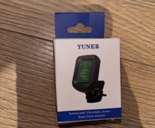Tuner, capo and strings (guitar, ukrlele and bass)