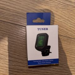 Tuner, capo and strings (guitar, ukrlele and bass)