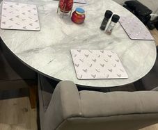 An amazing 43" round kitchen table and 4 chairs