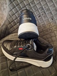 Levis black leather trainers