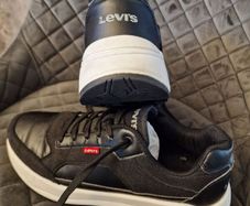 Levis black leather trainers