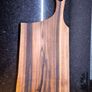 One piece of solid European Walnut, no glue, no joints. Hand-sanded and oiled with food-safe oil. Image 9