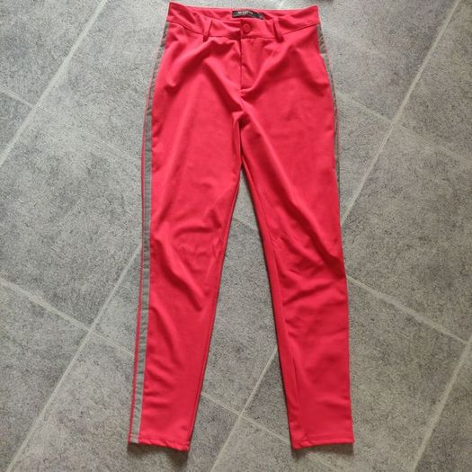 Red trousers and top set