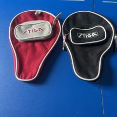 A pair of brand new table tennis racket covers