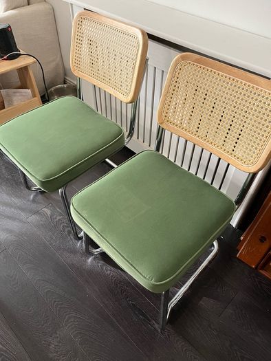 Glass table with two chairs
