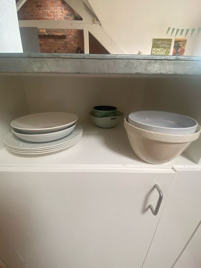 Pots, pans, glasses, silverware, cutting boards, bowls, plates, etc.