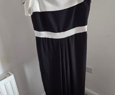 Never worn. Absolutely STUNNING Coast monochrome bardot jumpsuit. Size 18