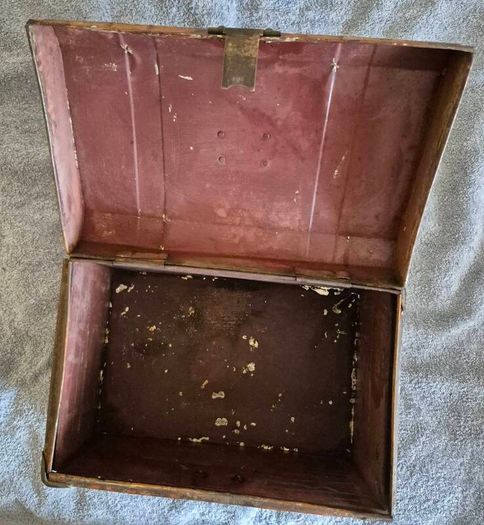 Small vintage metal trunk.