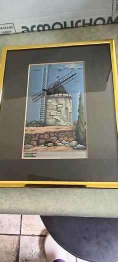 Is 3 pictuer Framed Le Tisserand Jacquard woven silk picture featuring a windmill 30.00 euro , old photo from Charleville, Co. Cork 18 euro, framed Holy post card  Pieta , Love and Honor Jesus 12 euro..
