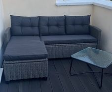 Rattan garden sofa and table