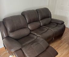 Brown leather recliner sofa