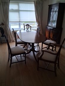 Dining Room Tables and chairs ( Six lovely soft cushion Mahogany chairs with adjustable Mahogany Dining room table.