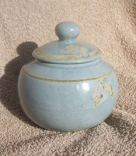 A studio pottery vase with its lid (excellent condition, no damage).