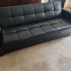 Black leather sofa bed