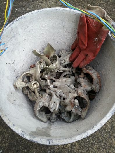 Bucket of scaffolding parts