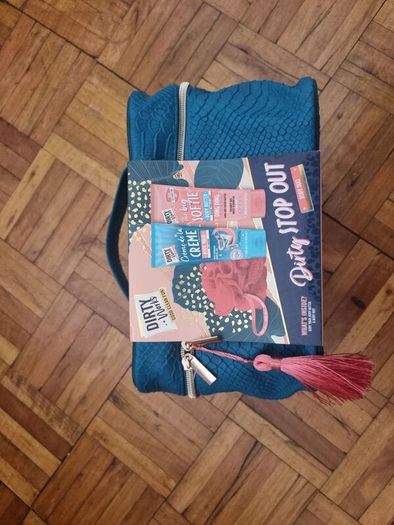 Dirty Works toiletry bag with body butter and wash