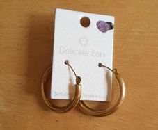 Golden hoop earrings (fashion jewellery)