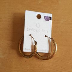 Golden hoop earrings (fashion jewellery)