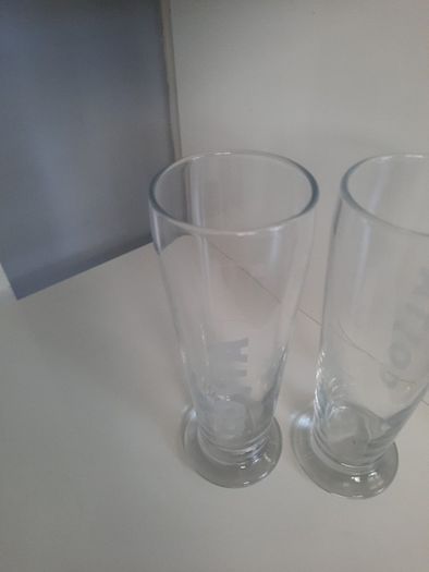 2 tall Costa glasses