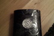 Black candle with silver circle
