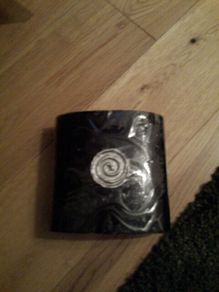 Black candle with silver circle