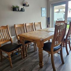 Solid oak dining table + 8 Chairs