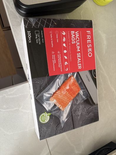 Vacuum sealer and bags