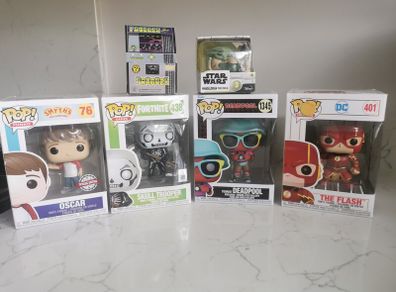 Mixed Funko Pop and collectible figure bundle in great condition