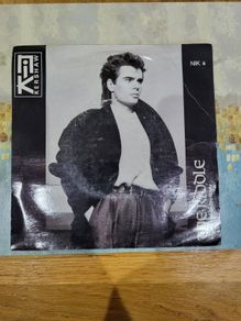 Nik Kershaw The Riddle 7 inch single NIK6
