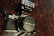 Olympus OM 10 camera with flash