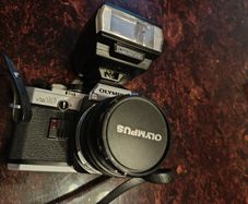 Olympus OM 10 camera with flash