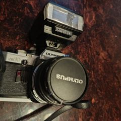 Olympus OM 10 camera with flash