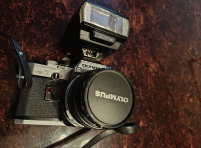 Olympus OM 10 camera with flash
