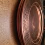 Gold/copper coloured metal plate charges Image 2