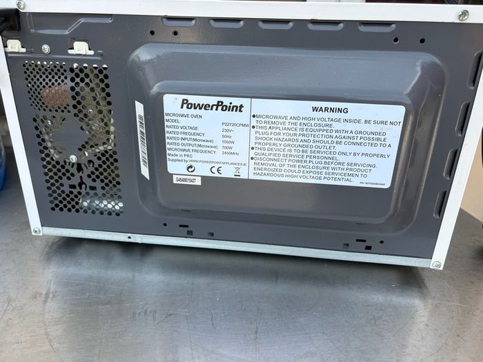 PowerPoint Microwave Old & rusty but Can be seen working.