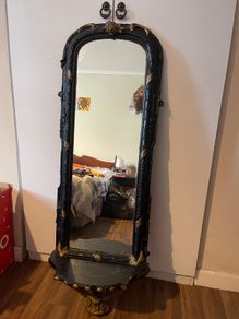 antique mirror with shelf