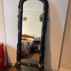 antique mirror with shelf