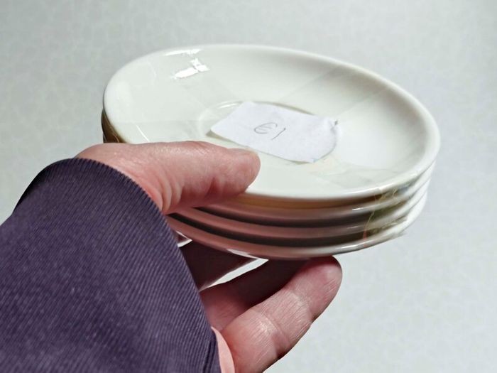 Milk Jug & 4 Saucers (used).