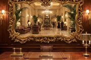 This is a fabulous old mirror...great size ...3d carving