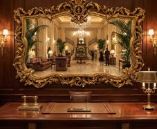 This is a fabulous old mirror...great size ...3d carving