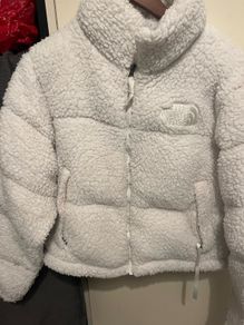 White Sherpa the north face jacket.