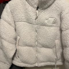 White Sherpa the north face jacket.
