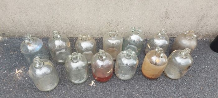 13 x demi johns,glass jars ,used condition, needs a clean,,buyer collects,,10 euros each or a deal  for the 13 ,sold as is