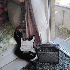 electric guitar and a compact practice amplifier from Gear4music